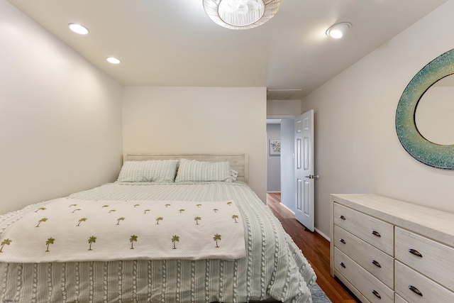 bedroom featuring dark hardwood / wood-style floors