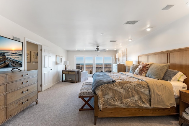 carpeted bedroom featuring access to outside and ceiling fan