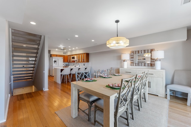 dining room featuring light wood-type flooring