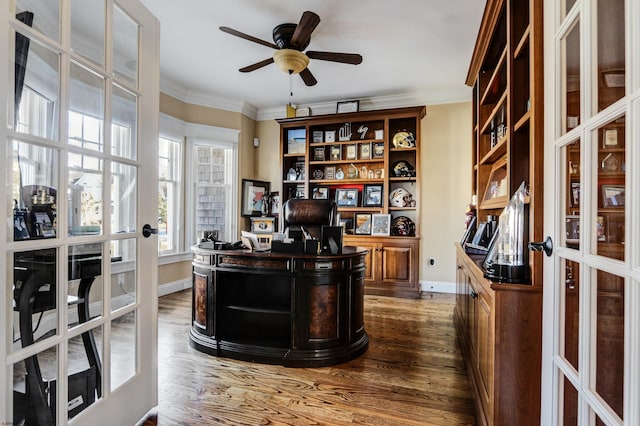 office space with crown molding, dark wood-type flooring, ceiling fan, and french doors