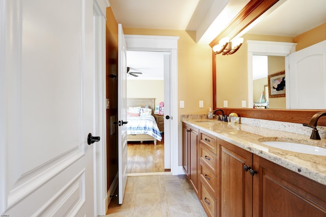 bathroom featuring tile patterned floors and vanity