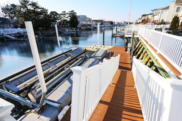 view of dock with a water view