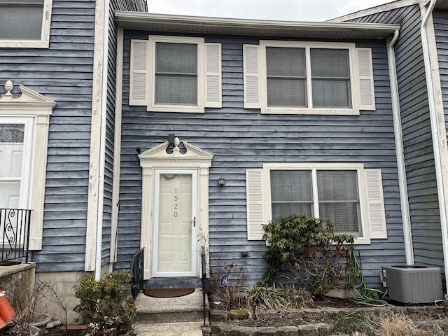 view of front facade with cooling unit