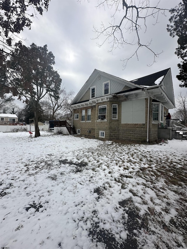 view of snow covered property