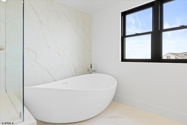 bathroom featuring a tub