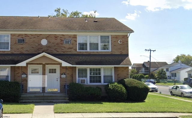 view of front of property with a front lawn