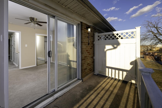 exterior space with ceiling fan