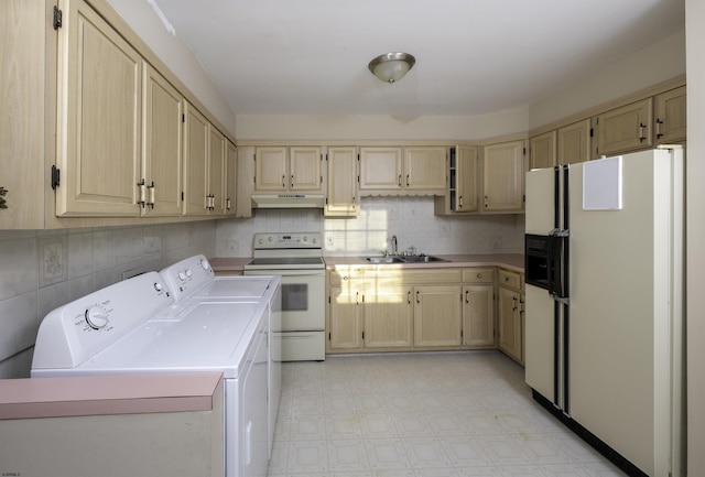 kitchen featuring light brown cabinetry, sink, decorative backsplash, washing machine and clothes dryer, and white appliances