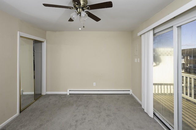 unfurnished room with light carpet, a healthy amount of sunlight, and baseboard heating