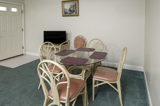 dining room with carpet flooring