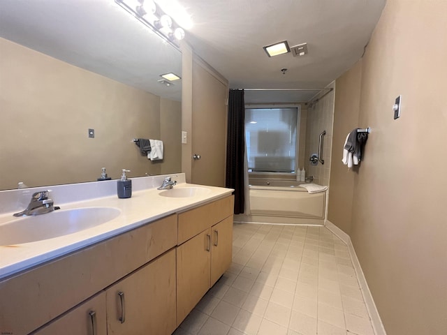 bathroom with vanity and a bathtub