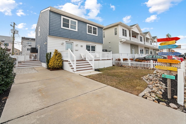 view of front of home with a front yard