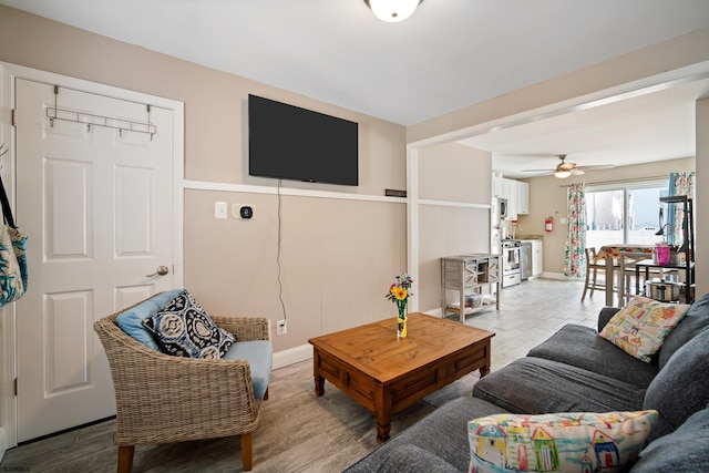 living room with ceiling fan