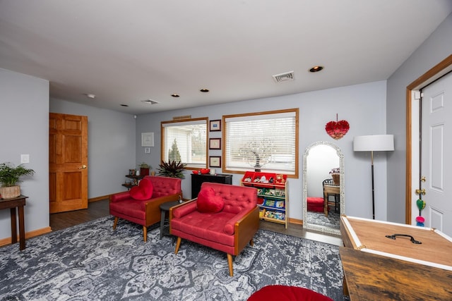 living area with dark wood-type flooring