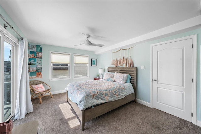 bedroom with ceiling fan and carpet flooring