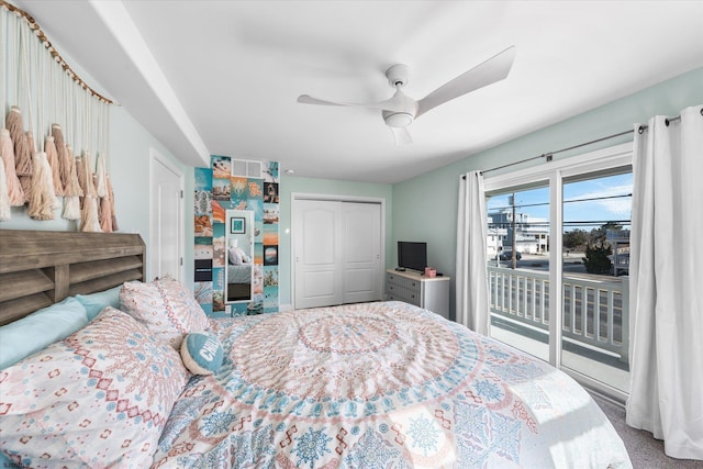 carpeted bedroom featuring access to exterior and ceiling fan