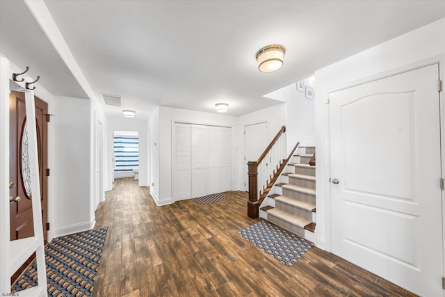 entryway featuring dark hardwood / wood-style floors