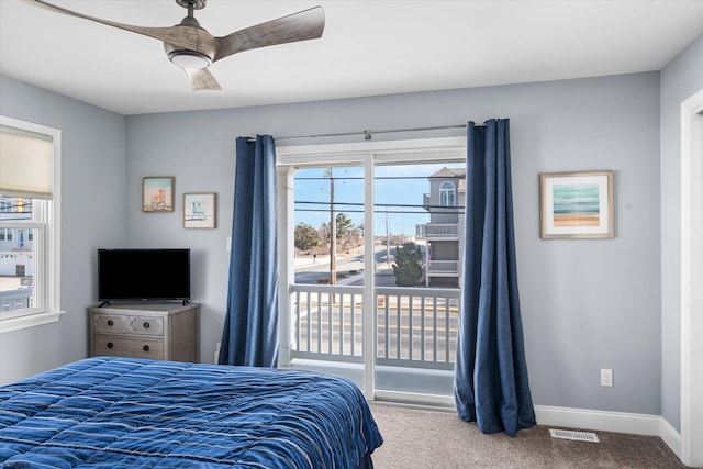 bedroom with ceiling fan, access to exterior, and carpet floors