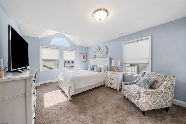 bedroom with vaulted ceiling and carpet