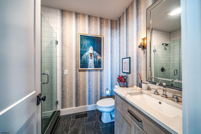 bathroom featuring walk in shower, vanity, and toilet