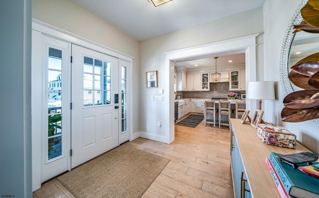 foyer entrance featuring light hardwood / wood-style flooring