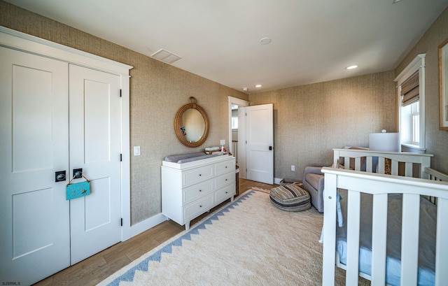 bedroom featuring light hardwood / wood-style flooring