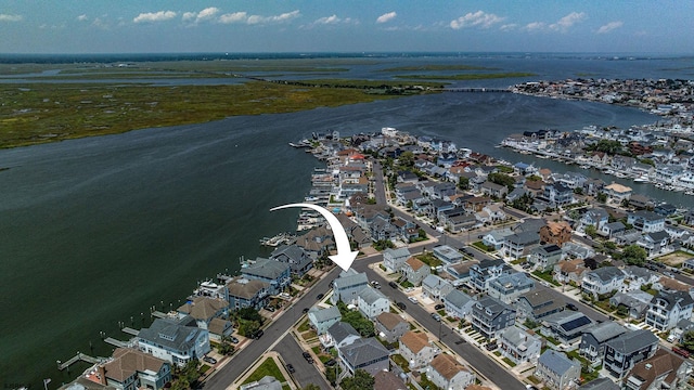 bird's eye view with a water view