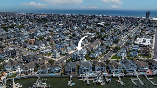 aerial view featuring a water view