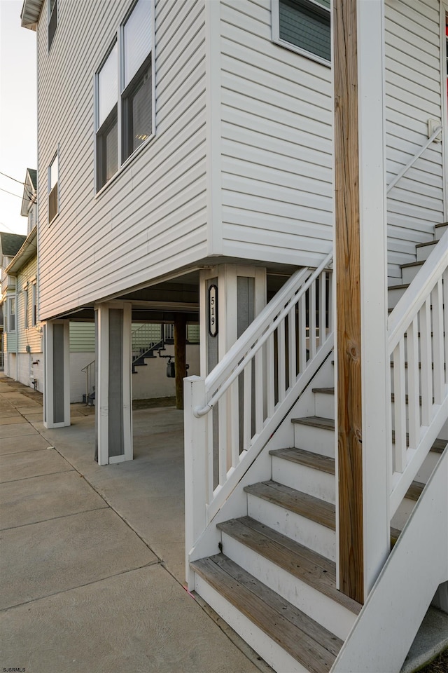 view of side of property with a patio