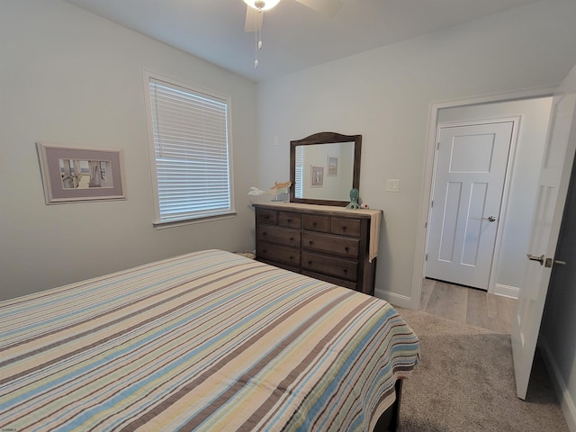 carpeted bedroom with baseboards