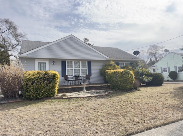 ranch-style house with a front yard