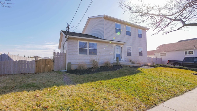 view of front of house with a front lawn