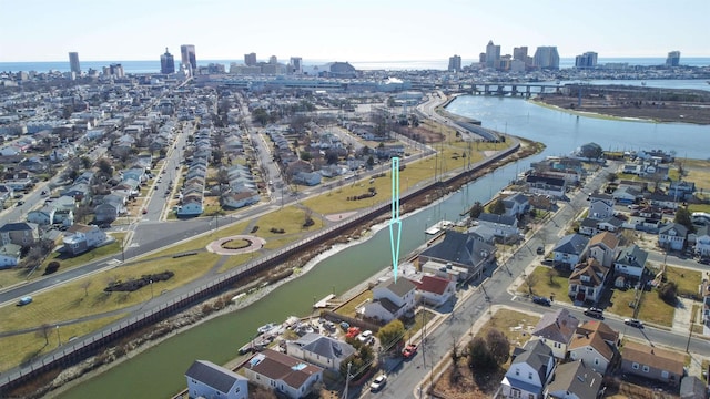 aerial view featuring a water view