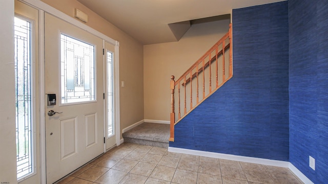 view of tiled foyer entrance