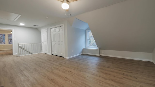 bonus room featuring hardwood / wood-style floors