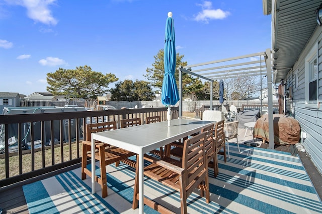 wooden terrace with a pergola