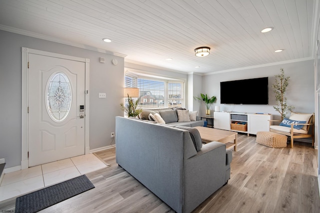 living room with wood ceiling, crown molding, and light wood-type flooring