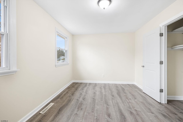 unfurnished bedroom with light hardwood / wood-style flooring