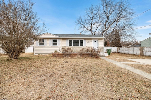 view of front of home with a front lawn