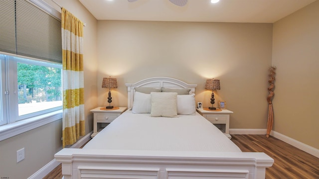 bedroom featuring dark hardwood / wood-style floors