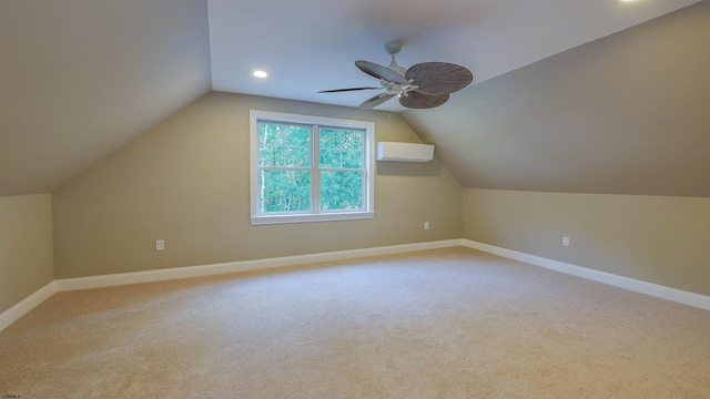 additional living space with light carpet, vaulted ceiling, an AC wall unit, and ceiling fan