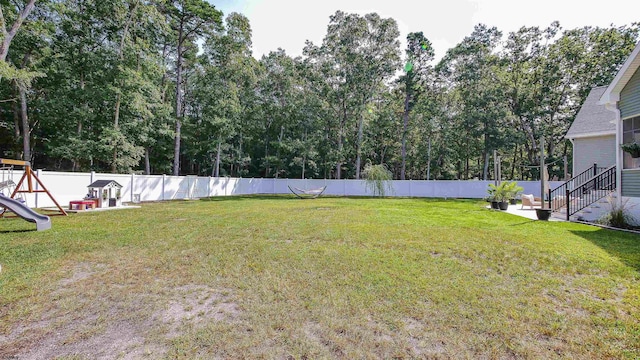 view of yard featuring a playground