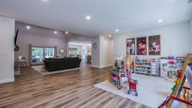 rec room with hardwood / wood-style floors