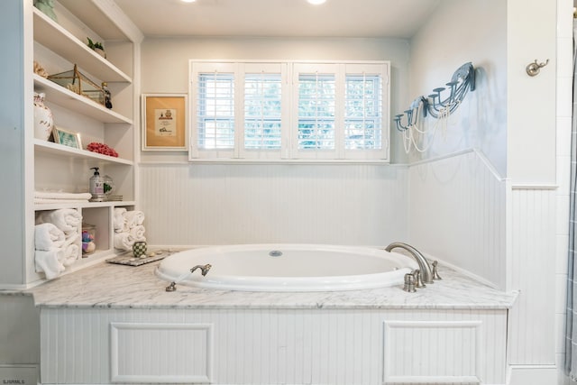 bathroom with a washtub