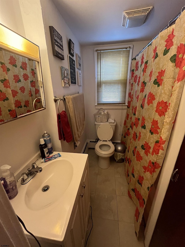 bathroom featuring walk in shower, vanity, toilet, and tile patterned flooring