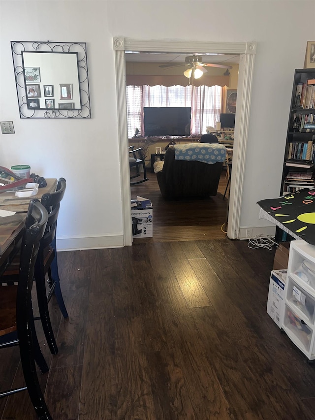 office area featuring ceiling fan and dark hardwood / wood-style flooring
