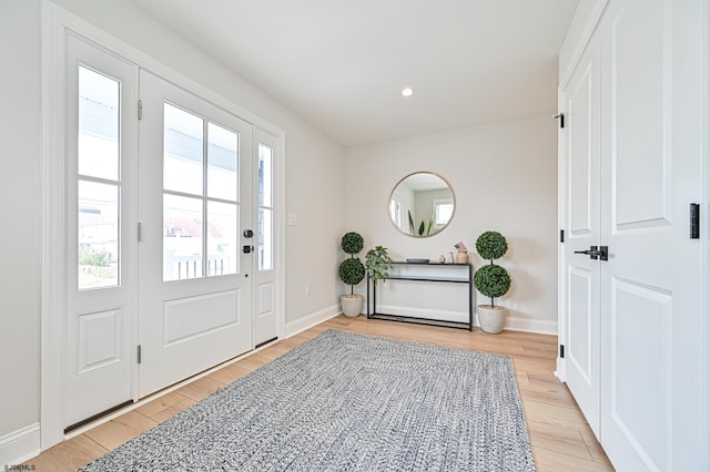 foyer entrance featuring light wood-type flooring