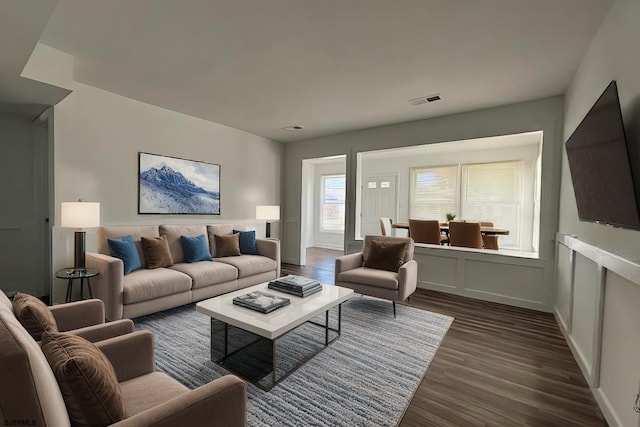 living room featuring dark hardwood / wood-style floors