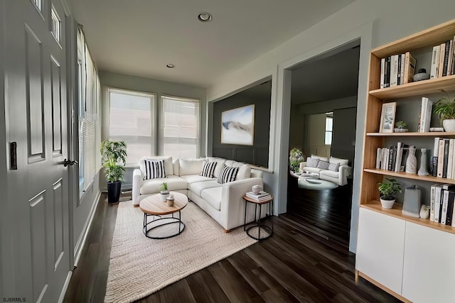 interior space with dark wood-style flooring and recessed lighting