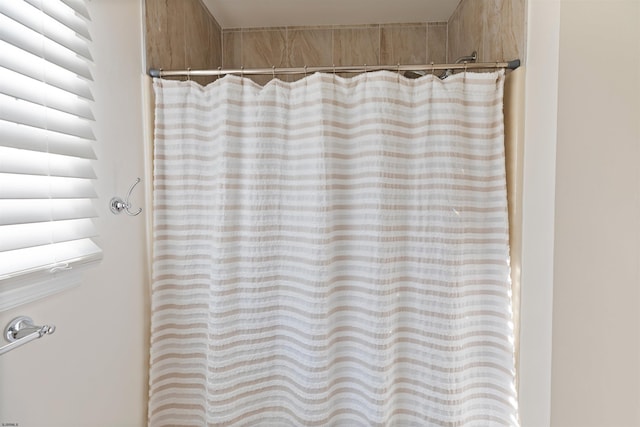 full bath featuring a shower with curtain